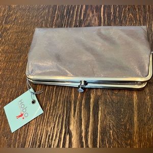 Hobo purse with tag new grey Genuine Leather